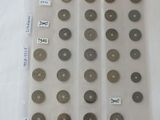 a lot of different types of coins in a plastic bag