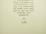 an old book with a black and white picture on it