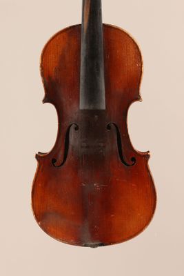 un vieux violon avec un fond en bois et un archet