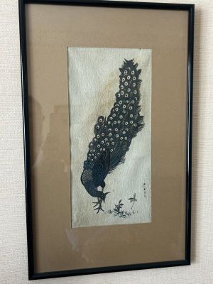 la photo d'une photo représentant un oiseau, dans un cadre