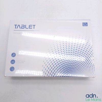 a close up of a box of tablets on a white surface
