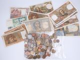 a bag full of different foreign currency on a table