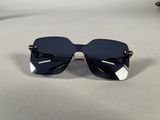 a close up of a pair of sunglasses on a table