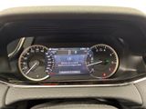 the dashboard of a car with a digital display in the center