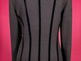 the back view of a black and grey jacket on a mannequin mannequin mannequin mannequin mannequin mannequin mannequin