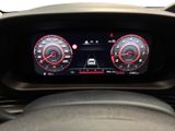 the dashboard of a car with two gauges and a steering wheel