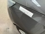 a close up of a car with a sticker on it ' s hood