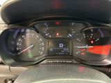 a close up of a car dashboard with a speedometer and gauges