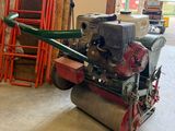 a small machine that is sitting in a garage