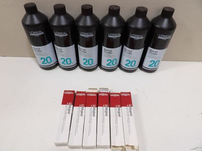 several bottles of wine are lined up on a table