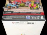 a box with a picture of a pokemon figure inside of it