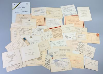 a pile of old letters and papers on a table