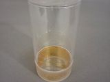 a plastic cup with a small amount of liquid in it