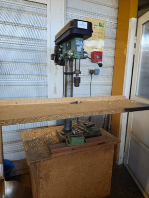 a machine that is sitting on top of a wooden table