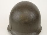 a close up of a helmet on a white surface
