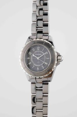 an image of a close up of a wrist watch on a white background