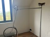 a bike leaning against a wall in a room