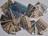 a lot of old postcards on the fridge