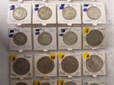 a lot of coins that are on the table