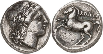 a silver coin with a horse on the front and a horse on the back