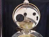 a close up of a watch in a case