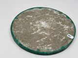 a picture of a dirty plate with a tag on it