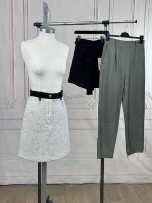 two mannequins that are on display in a room