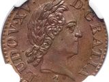 a close up of a coin with a woman ' s head on it