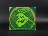 une boîte verte sur laquelle est représenté un lézard