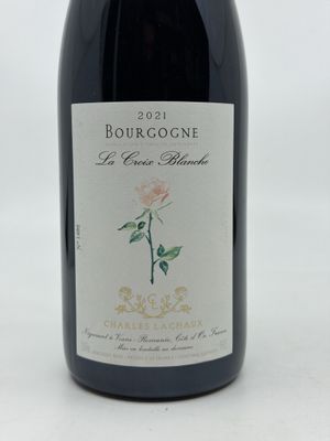 a bottle of wine that is sitting on a table