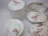 a lot of plates that are sitting on a table