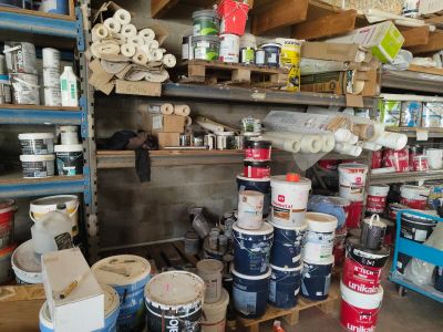 a room filled with many different types of paint