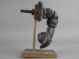 an image of a metal object with a hammer on top of it