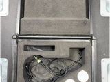 a black box with a pair of headphones inside of it