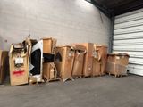 many cardboard boxes stacked up in a warehouse area