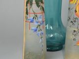 three vases sitting next to each other on a table