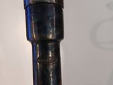 a close up of a metal object on a table