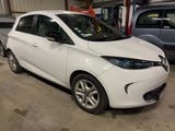 a picture of a white car parked in a garage