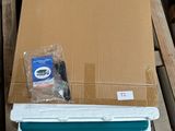 a laptop computer sitting on a pallet in a room
