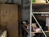 a room that has a lot of shelves and boxes on it
