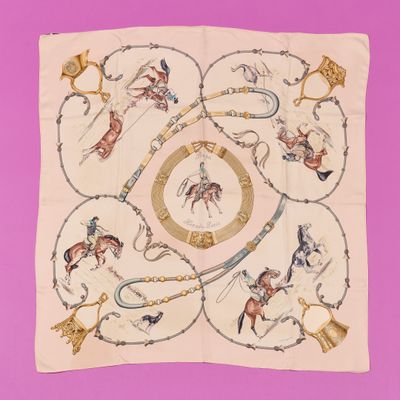 an image of a square scarf with a picture of a horse and rider on it