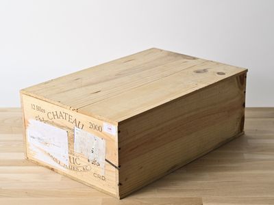 a wooden box that is sitting on a wooden table