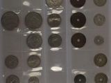 a lot of coins that are sitting in a box