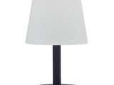 une lampe de table noire surmontée d'un abat-jour blanc
