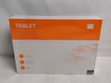 an orange and white box of a tablet on a white surface