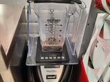 a blender that is sitting on a counter in a kitchen
