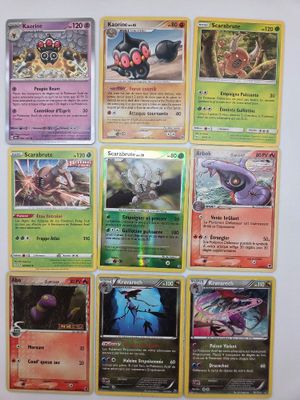 beaucoup de cartes pokemon sur le mur