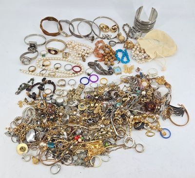 many different types of jewelry on the table