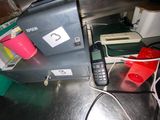 an image of a cell phone sitting on top of a counter