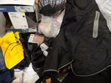 a pile of luggage that is sitting on a bed